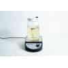 Ball mason jar with stirrer inside and magnetic stirrer machine