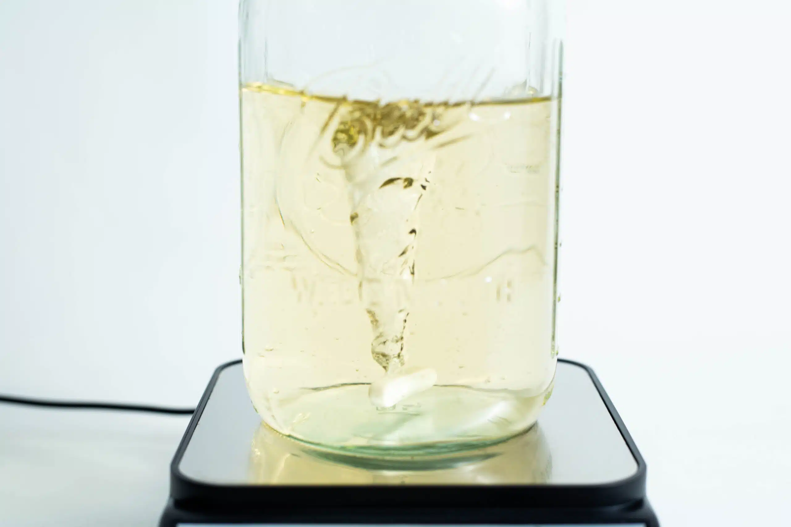 Ball mason jar with stirrer inside