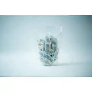 A clear plastic bag containing multiple Desiccant Silica Gel 5g | Reusable sachets stands upright against a plain white background. The sachets display blue and white text on their surface.
