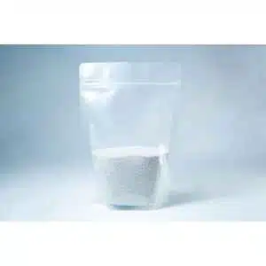 A resealable plastic pouch, filled halfway with white coarse Natural Gypsum mushroom supplement for grain and substrate, is displayed against a plain light background.