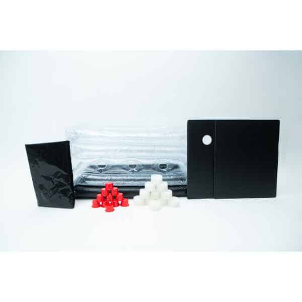 The Boomer Shroomer V 2.0 Inflatable Monotub Kit for Growing Mushrooms includes black and clear plastic sheets, a black rectangular bag, two ventilated panels, and pyramid-shaped red and white filter plugs—perfect for mushroom cultivation.