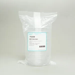 A sealed plastic pack holds a stack of clear 90mm NEST Petri dishes, 3-vent, sterile, gamma irradiated. The white and blue label displays item no. 752204 and barcode, set against a plain light background.