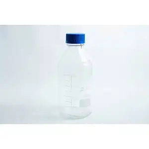 A Reagent bottle 500ml / 1000ml with clear glass, blue screw cap, and volume graduations is shown against a plain white background.