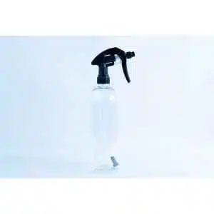 The Spray bottle Chemical resistant 1 Litre Heavy Duty stands upright on a light blue background, featuring a clear body, black trigger nozzle, and visible tube inside—ideal for handling various liquids.