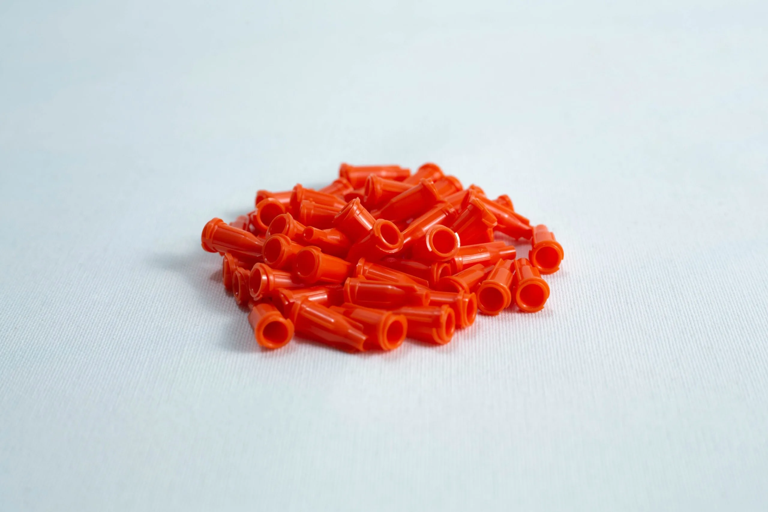Photo Showing Syringe Caps, Front View