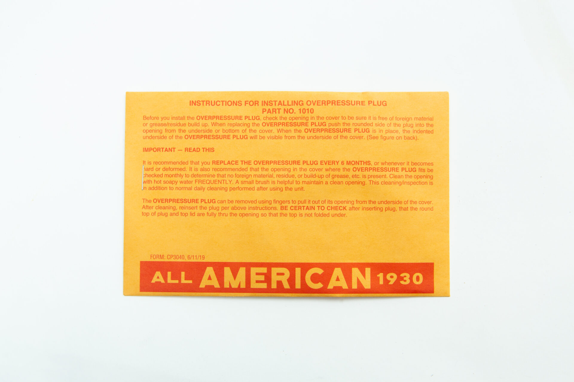 All American rubber overpressure plug for sterilizer | Orange | Part 1010 2 An orange rectangular card for the All American rubber overpressure plug (Part 1010) for sterilisers, featuring black and red "Instructions for Installing Rubber Overpressure Plug" text and "ALL AMERICAN 1930" at the bottom.