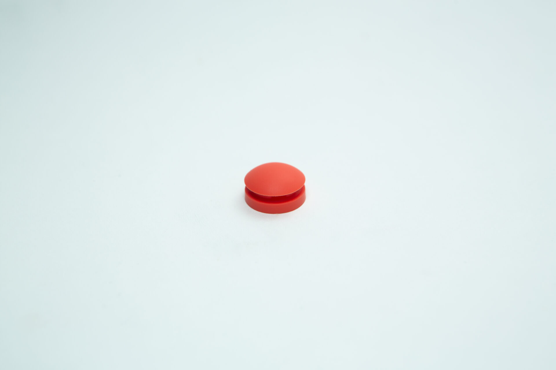 All American rubber overpressure plug for sterilizer | Orange | Part 1010 1 An All-American rubber overpressure plug for steriliser, orange (Part 1010), is centred on a plain, light background.