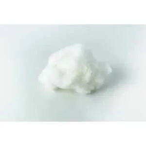 A small, fluffy ball of Polyfill fibre for Mycology sits on a light surface, casting a gentle shadow underneath.
