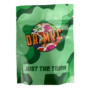 The DRMyc Just-the-Trich - For Substrate Vitality features a green camouflage pouch with bold orange "DRMyc" lettering and a circular mushroom illustration, plus "Just-the-Trich" in black at the bottom—designed to boost your substrate's vitality.