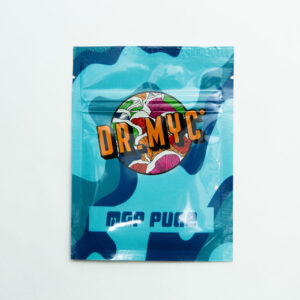 A blue resealable pouch labelled DRMyc Adaptive Liquid Culture Premix, with a vibrant mushroom illustration and "MGA PUGA" below, is shown on a plain white background—ideal for liquid culture enthusiasts.