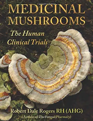 Medicinal Mushrooms: The Human Clinical Trials by y Robert Dale Rogers 1 Cover of "Medicinal Mushrooms: The Human Clinical Trials" by Robert Dale Rogers, showing close-up images of colourful bracket fungi with layered brown, yellow, and green rings.