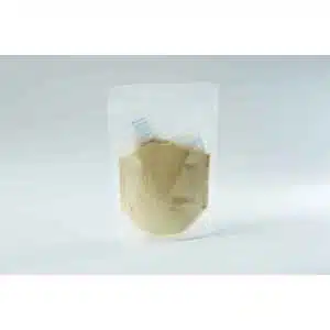 A clear resealable plastic pouch filled with light-coloured powder, containing visible moisture absorber sachets, placed against a plain white background.