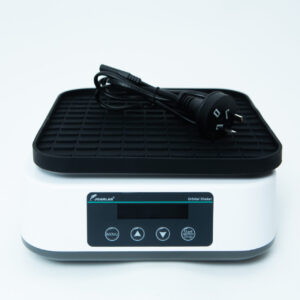 Home 10 A laboratory orbital shaker with a digital display and control buttons on the front. A power lead with an Australian plug rests on the top platform. The background is plain white.
