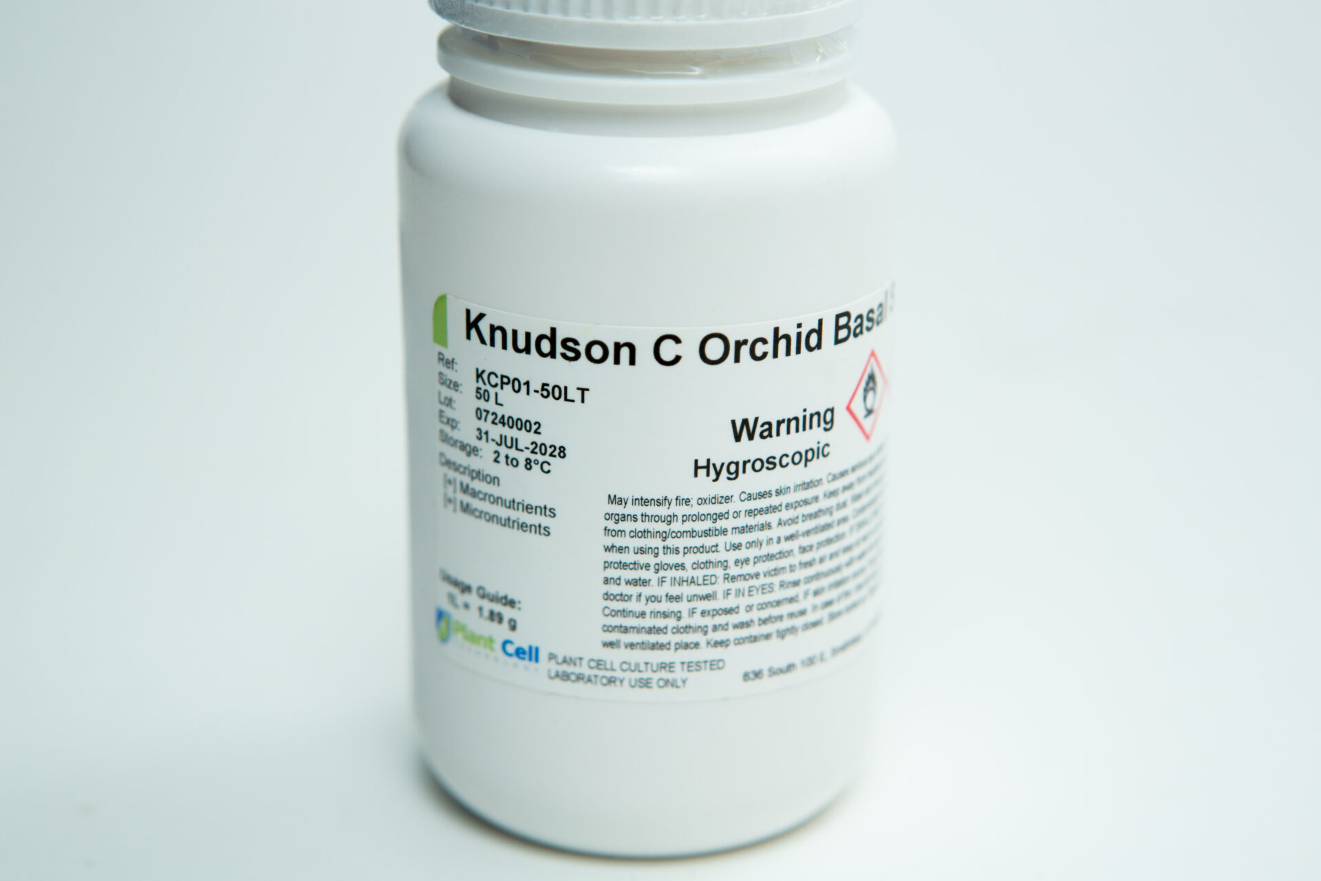 Plant Cell Knudson C Orchid Basal Salts - Orchid Germination Media | Makes 10L 1 A white plastic container labelled Knudson C Orchid Basal, with warnings including Hygroscopic. The container displays product and batch information, manufacturer details, and instructions in small text.