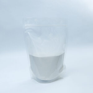Home 10 A clear, resealable plastic bag filled halfway with a fine white powder, standing upright against a plain, light background.