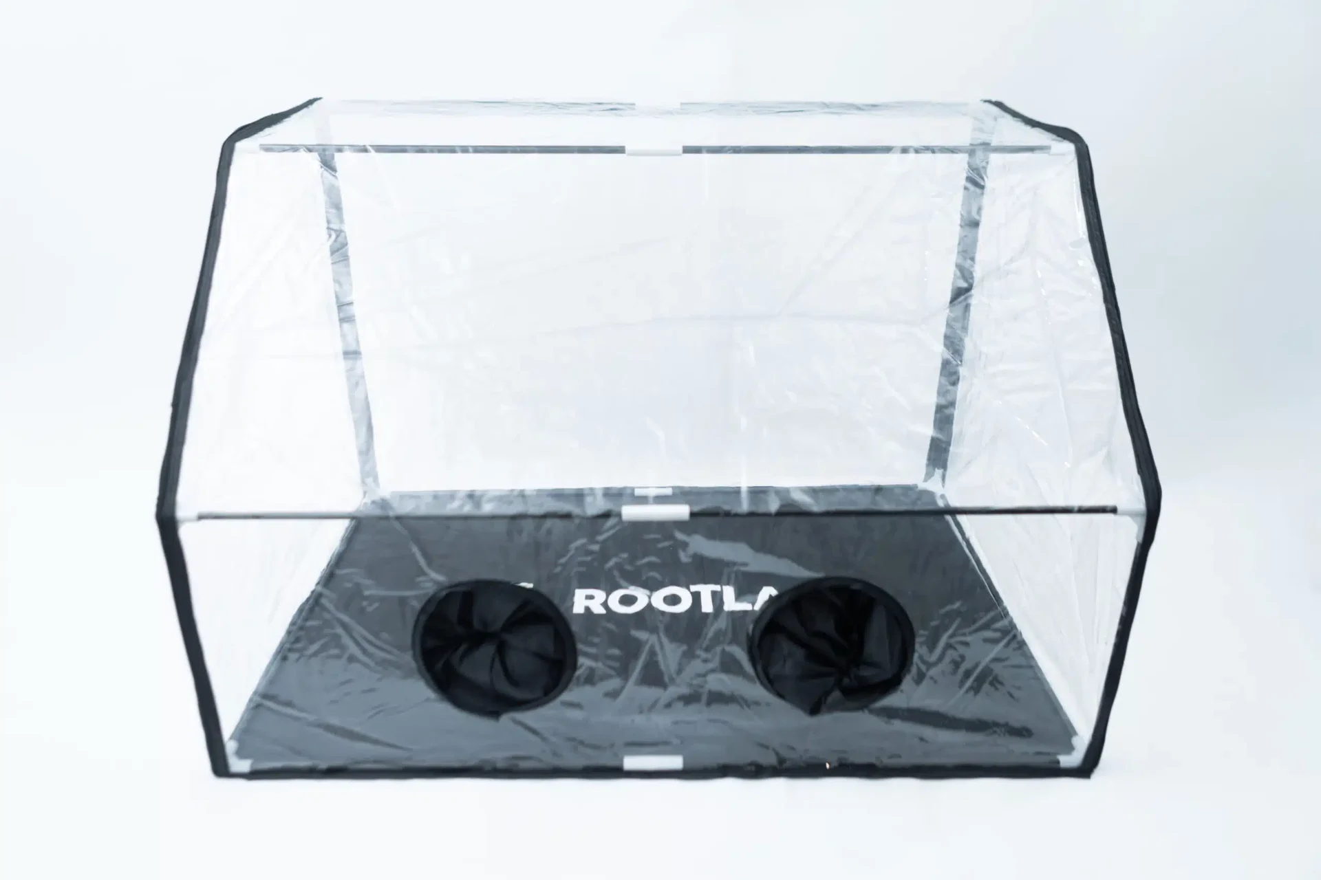 Rootlab Still Air Box with angled viewing window- XL 1 A transparent rectangular enclosure with a black base displaying the word ROOTL and two circular mesh openings, designed for controlled environment applications.