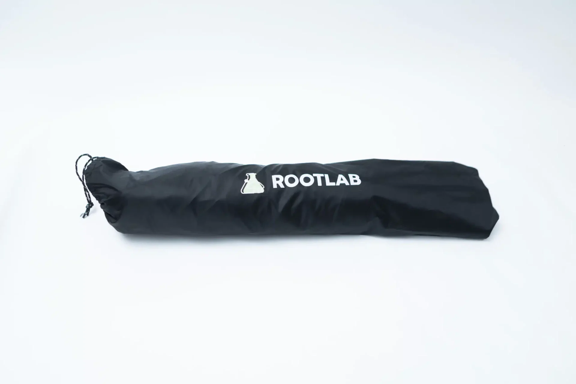 Rootlab Still Air Box with angled viewing window- XL 8 A long, black drawstring bag with the word ROOTLAB and a white flask logo printed on it, placed on a white surface.