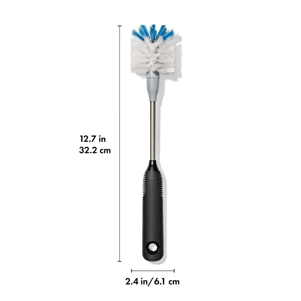 OXO Good Grip Stainless Steel Bottle Brush with replaceable head 7 Bottle brush with black handle and white and blue bristles, shown vertically. Length is 12.7 inches (32.2 cm) and width at the brush head is 2.4 inches (6.1 cm). The handle has a hole near the end.